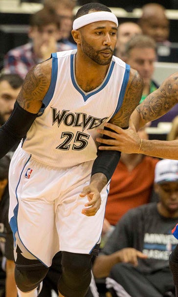 Amid excitement of home opener, veterans lift new-look Wolves to win